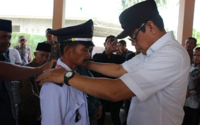 Pelantikan Irman Sebagai Kades Antarwaktu Desa Pangi, Bupati H. Erwin Burase Tekankan Persatuan dan Kerja Nyata