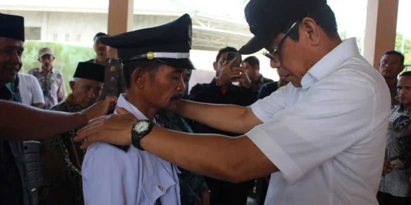Pelantikan Irman Sebagai Kades Antarwaktu Desa Pangi, Bupati H. Erwin Burase Tekankan Persatuan dan Kerja Nyata